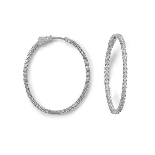 Oval in/out cubic zirconia hoop earrings in rhodium plated over .925 sterling silver.