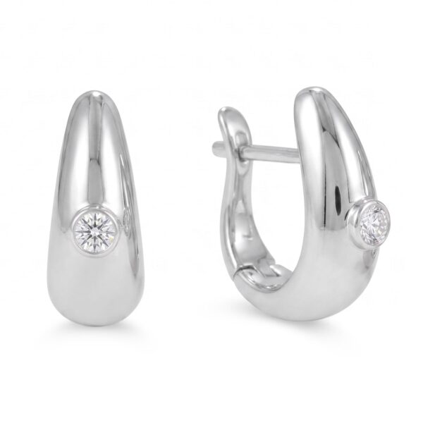 Rhodium plated dome hoop earrings with lab grown diamond details.
