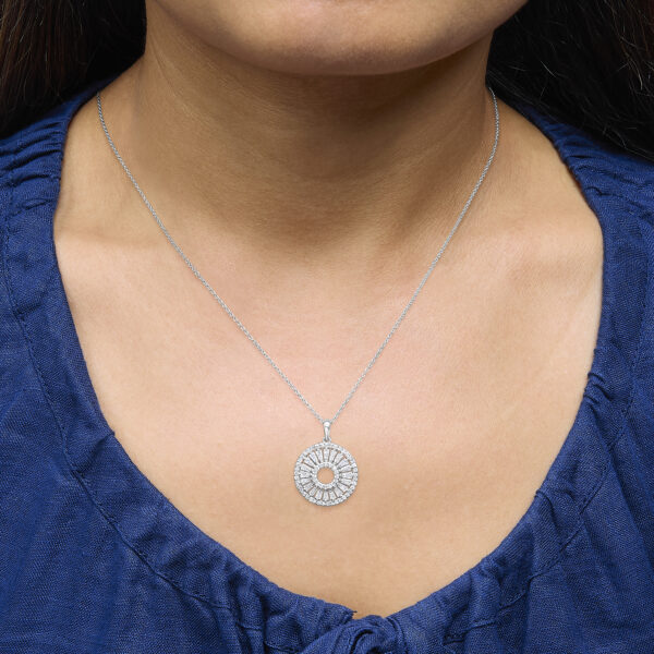 Diamond medallion pendant necklace displayed as worn, showing the chain length and drape