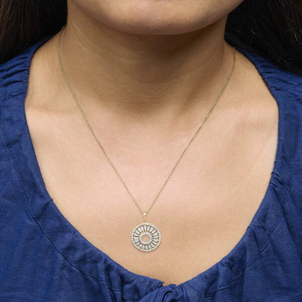 Sunburst medallion pendant worn on a model to show placement on the chest