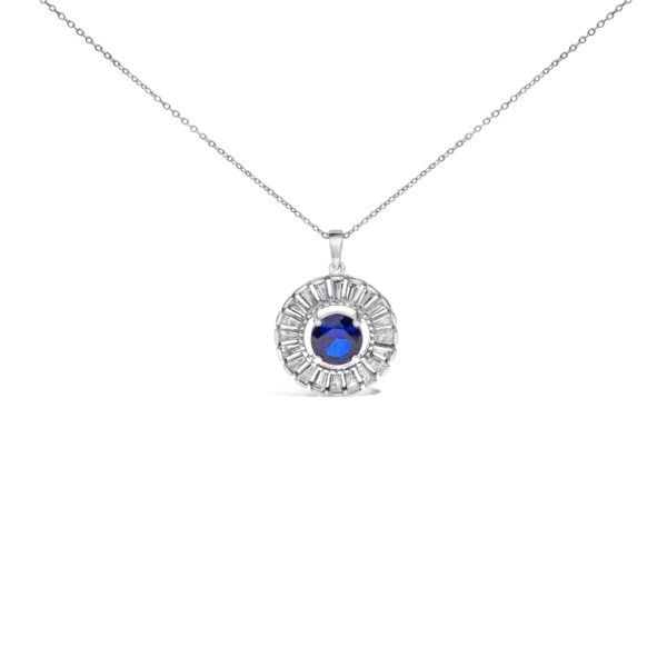 Sterling silver medallion pendant with a round blue center stone framed by baguette diamonds, on a cable chain