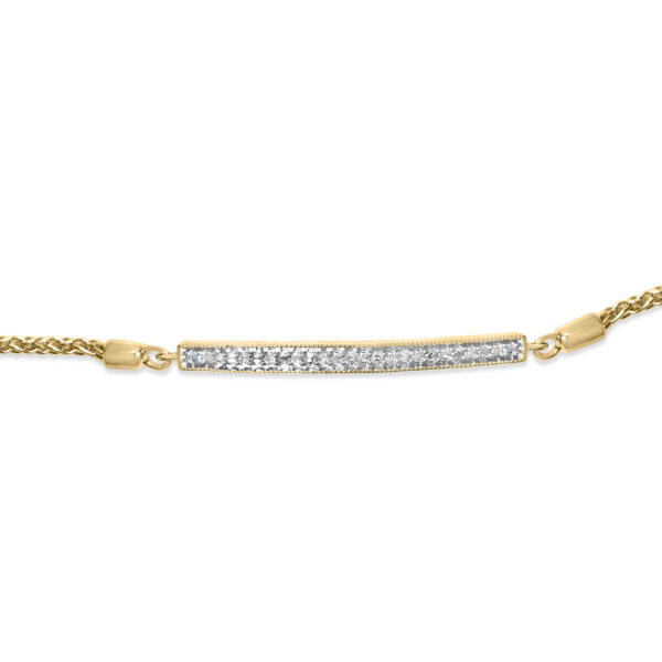 Close-up of the pave-set diamond bar on the 24K gold vermeil (plated) bolo bracelet showing individual stone placement