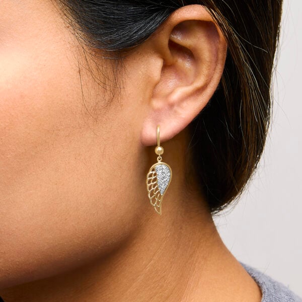 24K Gold vermeil angel wing drop earring shown worn on the ear