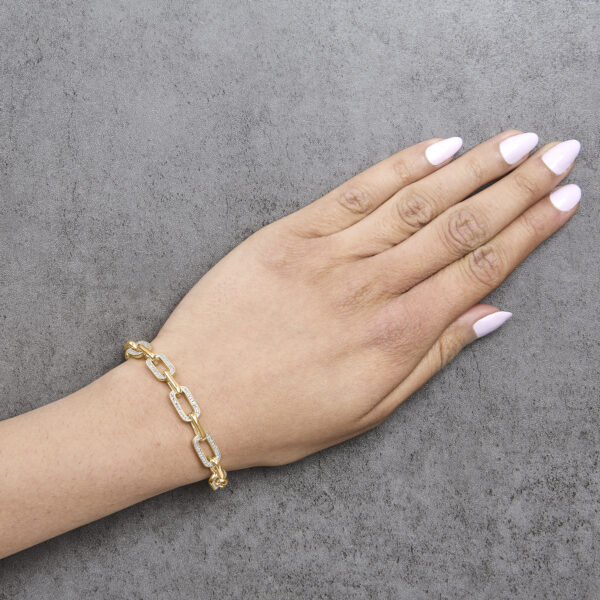 Paperclip link bracelet worn on a wrist