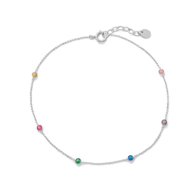 Sterling silver anklet strung with multicolor plastic beads, laid out to show full length and clasp