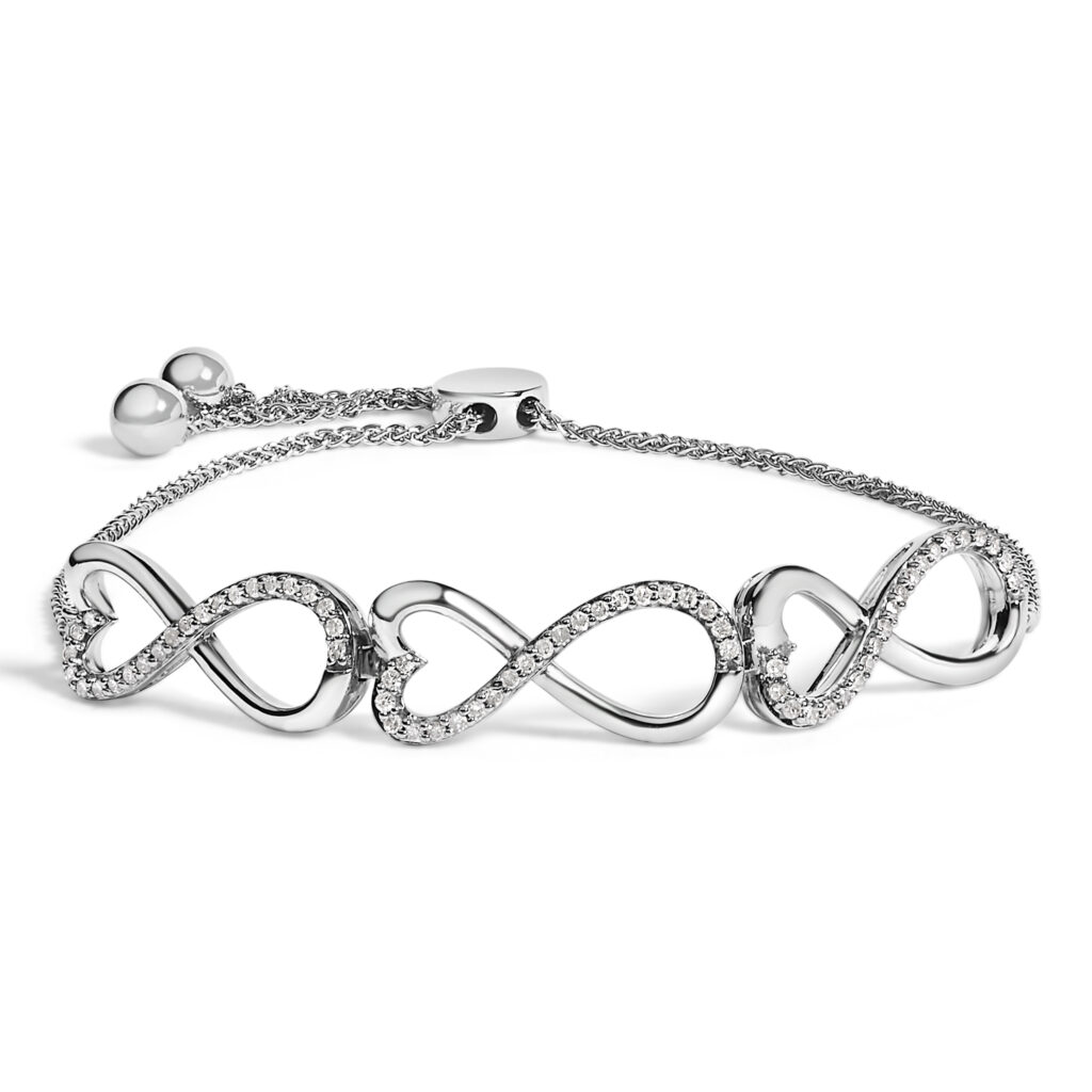 Sterling bolo bracelet with infinity heart links set with round diamonds, laid flat