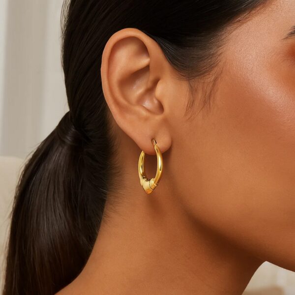 Medium Heart Hoop Earrings in 14K Yellow Gold - alternate view 2