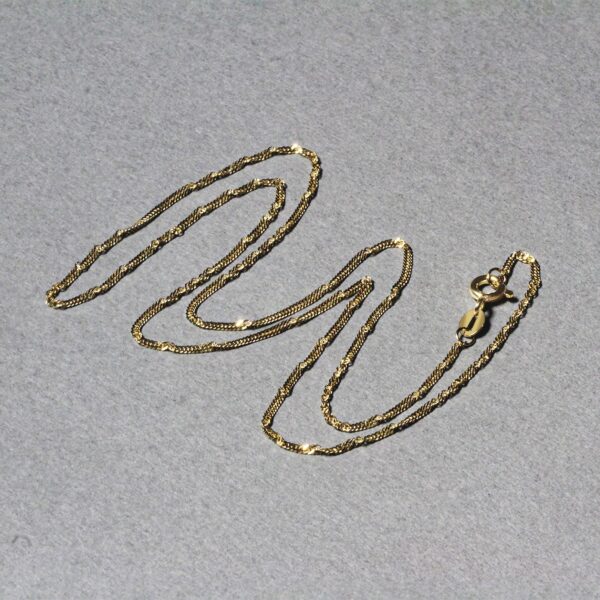14k Yellow Gold Singapore Chain (1.30 mm) - alternate view 5