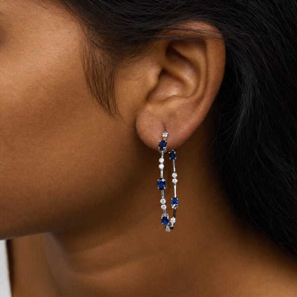 14K White Gold 6/7 Cttw Diamond and Oval Blue Sapphire Station Hoop Earrings - alternate view 5