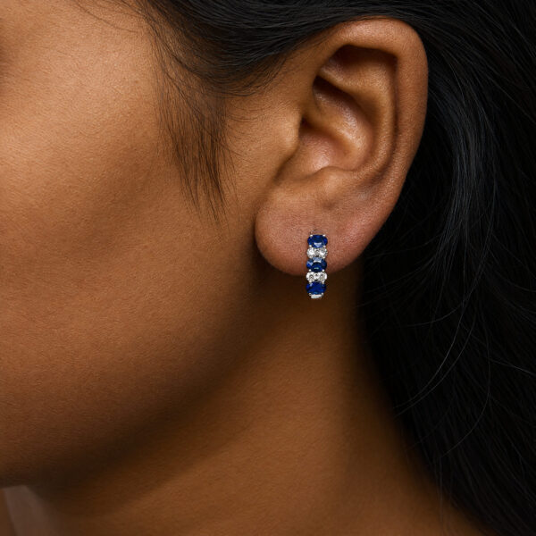 10K White Gold 1/4 Cttw Diamond and Oval Blue Sapphire Alternating Huggie Hoop Earrings - alternate view 5