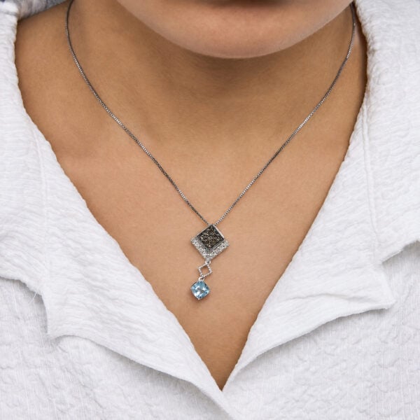 10K White Gold 5/8 Cttw Diamond and Created Cushion Blue Topaz Geometric Drop Pendant Necklace - alternate view 5