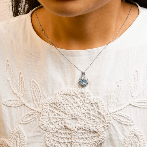 Sterling Silver Oval Blue Topaz and Diamond Accent Beaded Halo Pendant Necklace - alternate view 5