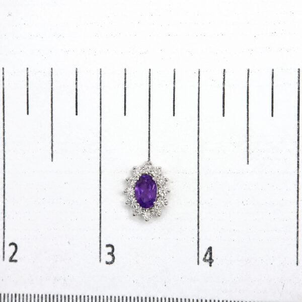 Sterling Silver 1/8 Cttw Diamond Starburst Oval Amethyst Stud Earrings - alternate view 4