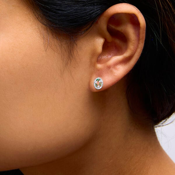 14K Yellow Gold Oval Emerald and 1/7 Cttw Diamond Stud Earrings - alternate view 5
