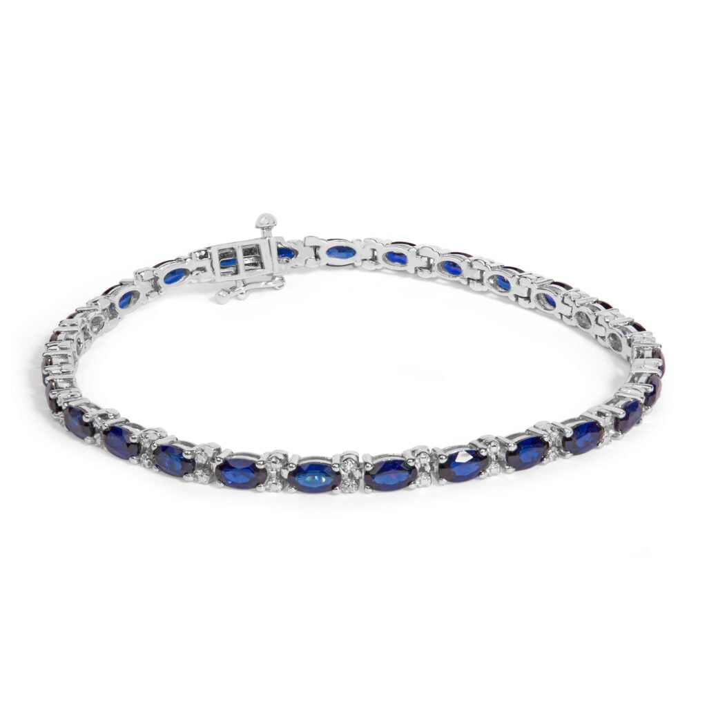 Sterling Silver Alternating Diamond Accent and Oval Blue Sapphire Tennis Bracelet