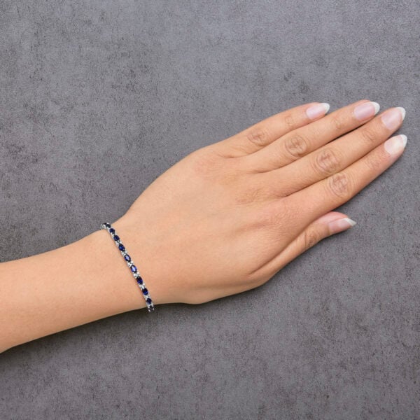 Sterling Silver Alternating Diamond Accent and Oval Blue Sapphire Tennis Bracelet - alternate view 5